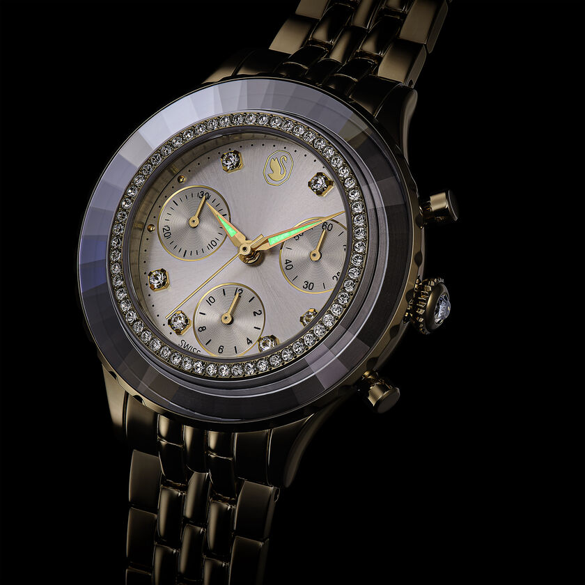 swarovski ساعة octea chrono، صناعة سويسرية، سوار معدني، لون ذهبي، لمسة نهائية بلون ذهبي شامبين