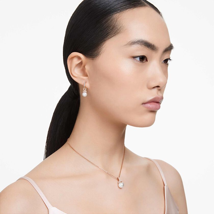 swarovski originally set  white  rose gold tone plated
