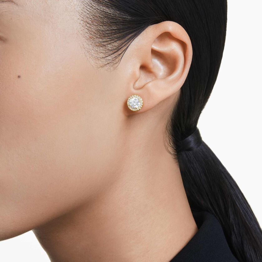swarovski una stud earrings  round cut  gold tone  gold tone plated